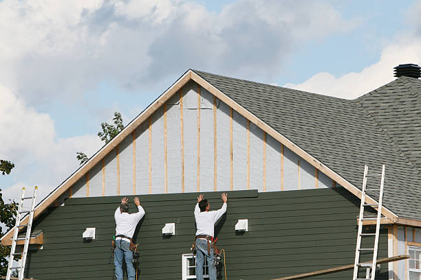Professional Siding Installation technician working in Broomfield, CO